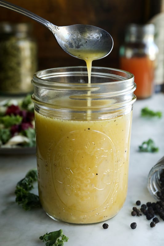 Four thieves vinegar can be useful in many ways, including made into a vinaigrette for topping healthy salads. Using olive oil as an emulsifier, this vinaigrette is tangy and continues to deliver wellness supporting herbs and spices.  