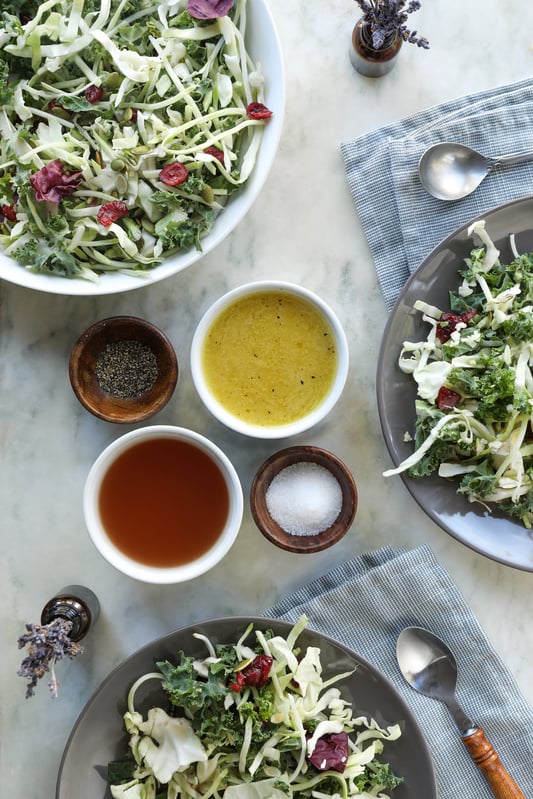 Four thieves vinegar can be useful in many ways, including when made into a vinaigrette for topping healthy salads. Using olive oil as an emulsifier, this vinaigrette is tangy and continues to deliver wellness-supporting herbs and spices.  