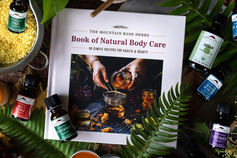 The mountain rose herbs bodycare book sits with dIY bodycare projects nearbyy