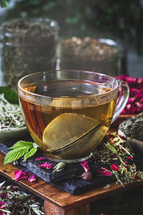 A cup of brewing herbal tea