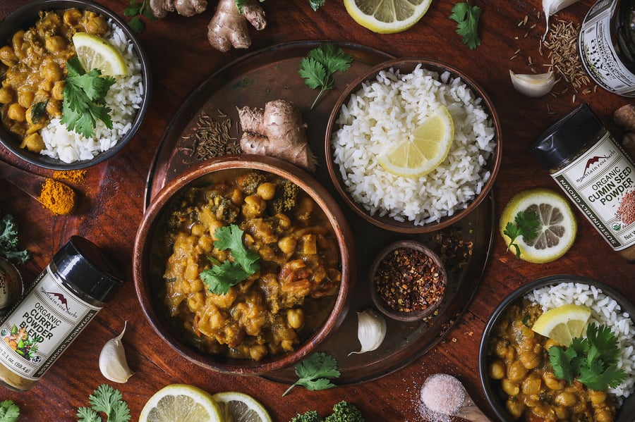 An overhead photograph of chickpea curry in bowls