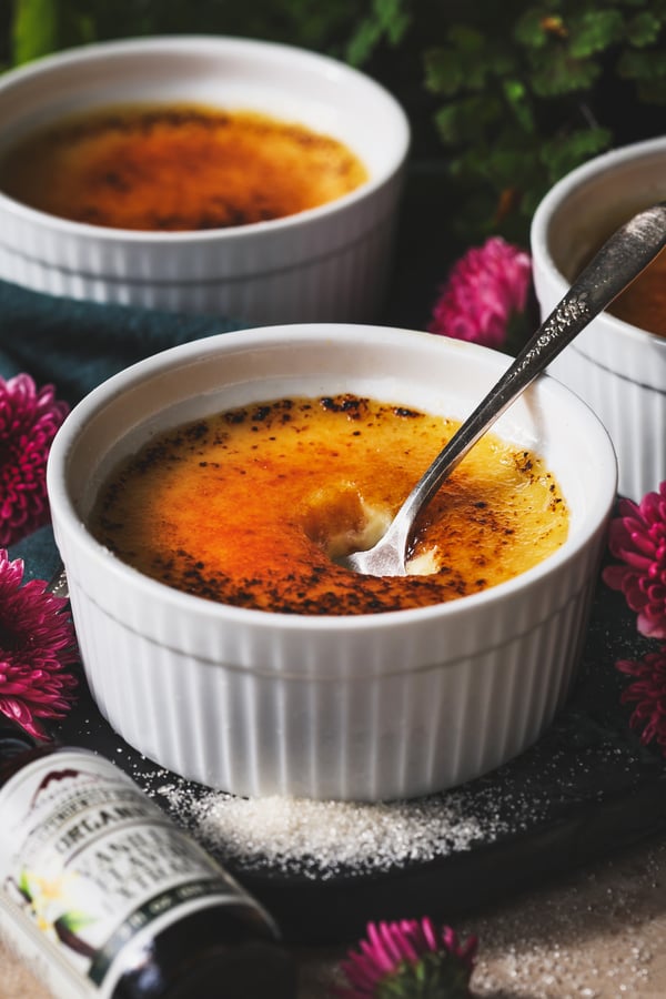 Creme brulee with a spoon in it