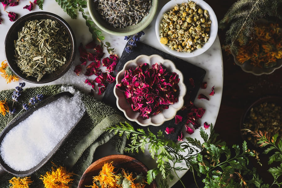 Dried herbs for bath blend in bowls 