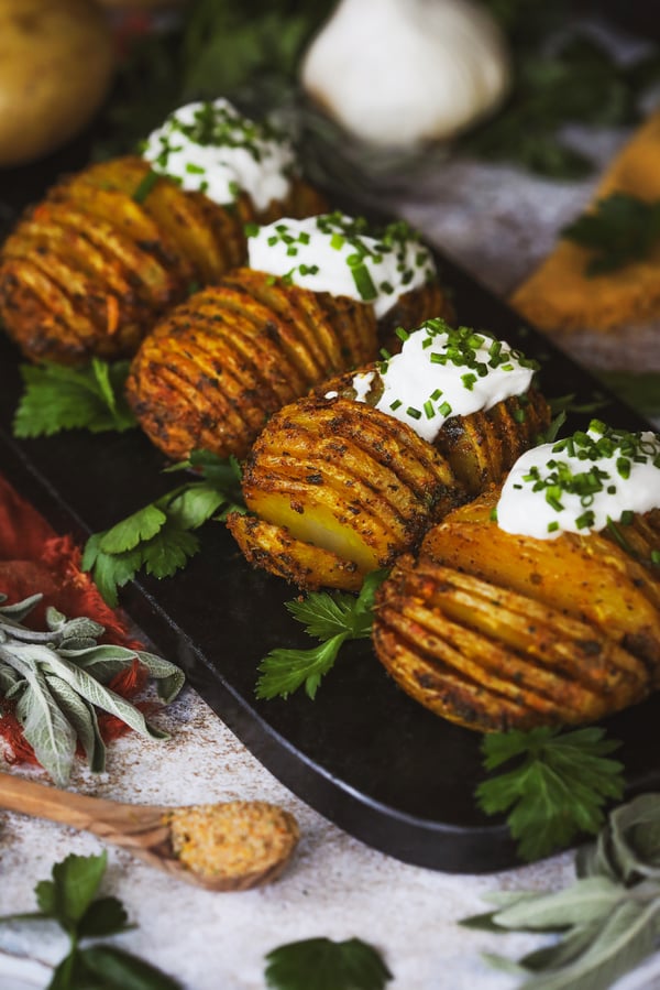 Hasselback potatoes with sour cream and chives