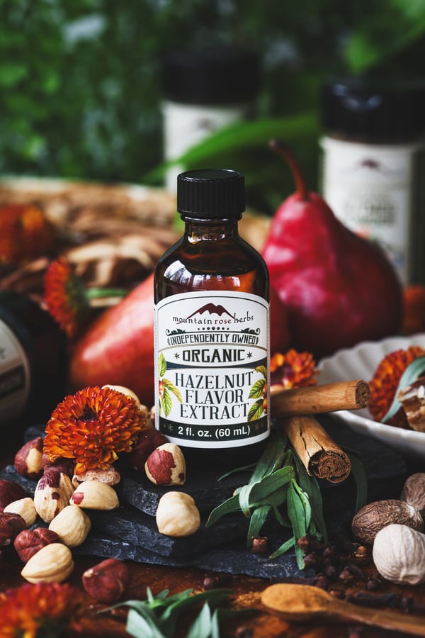 A close up photo of a bottle of hazelnut flavor extract