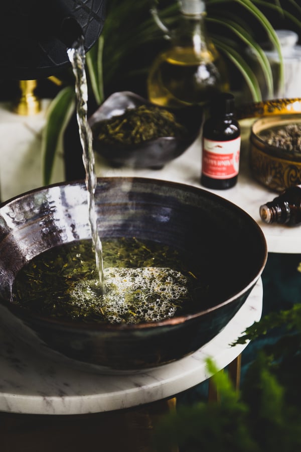 Ingredients for a diy green tea cooling compress.