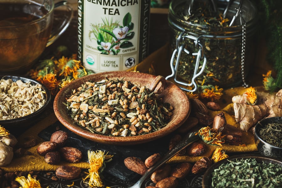 Ingredients for warming herbal tea blends on a tray