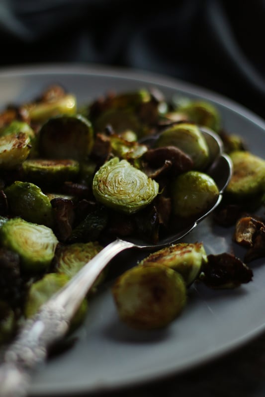 Roasted brussels sprouts with shiitake mushrooms. Crispy Brussels sprouts with reconstituted shiitake mushrooms and shallots. 
