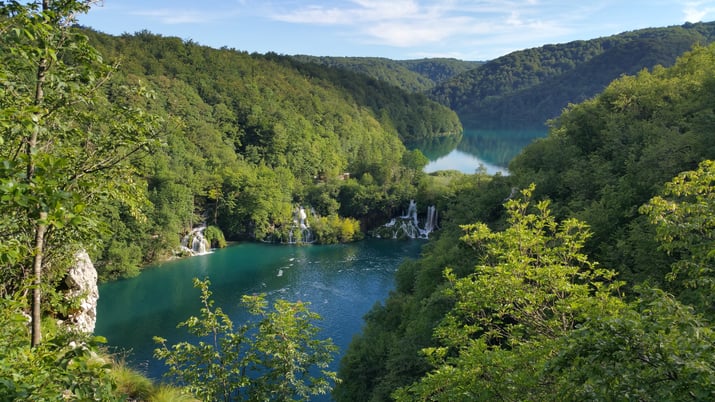 Lush forests with canyon showing turquoise-colored river in Budapest