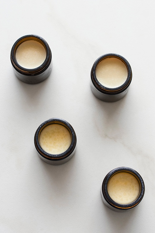 Three glass jars filled with homemade deodorant