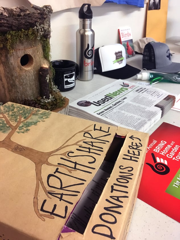 Donation box for earth share and flyers and pamphlets for employees Donation box for earth share and flyers and pamphlets for employees