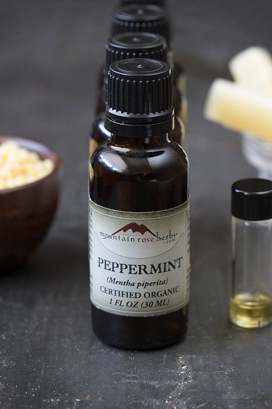 Bottle of certified organic and 100% pure peppermint essential oil