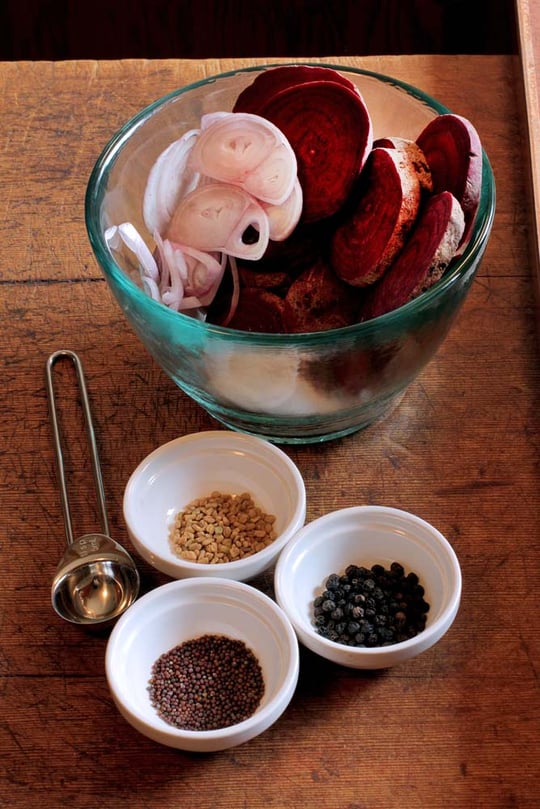 Ingredients to make pickled devil eggs with curry including beets