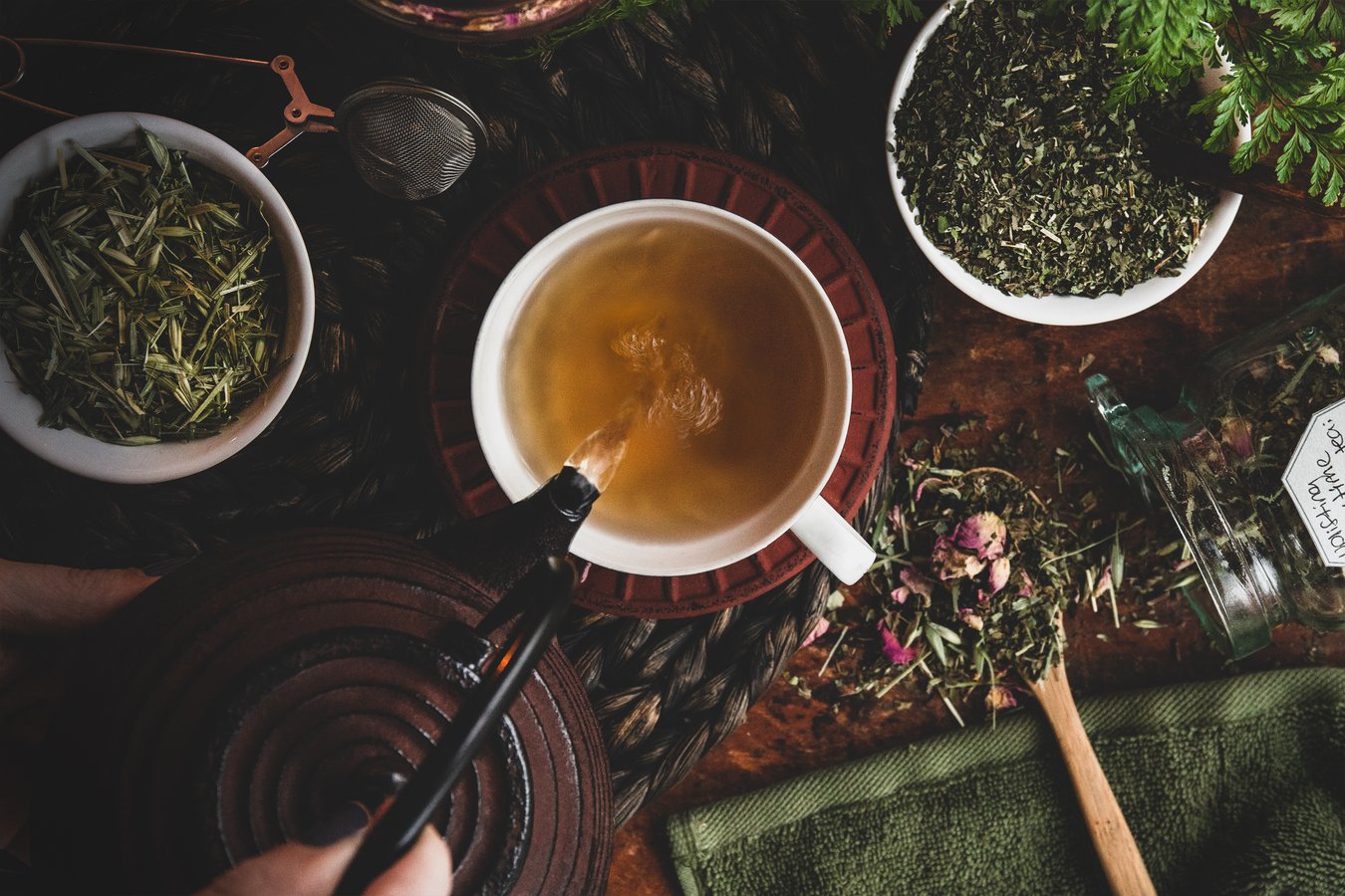 A delicious cup of herbal tea is poured.