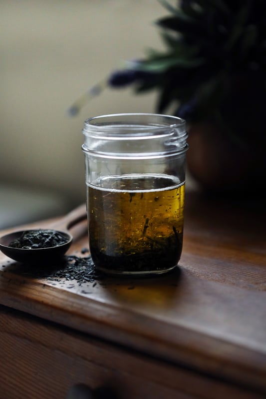 Tea-infused herbal oil for homemade makeup remover.