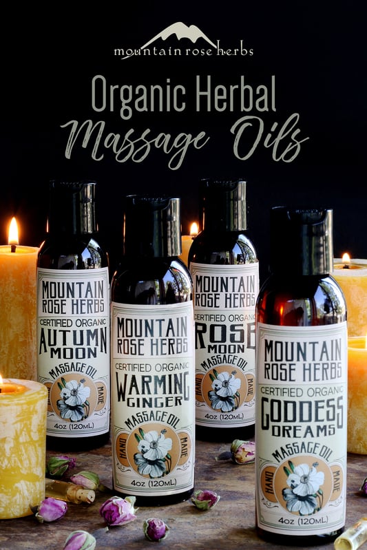 Pinterest link to Mountain Rose Herbs. Natural and organic massage oil collection arrange with beeswax candles and dried rose buds. Four natural massage oil varieties from Mountain Rose Herbs.