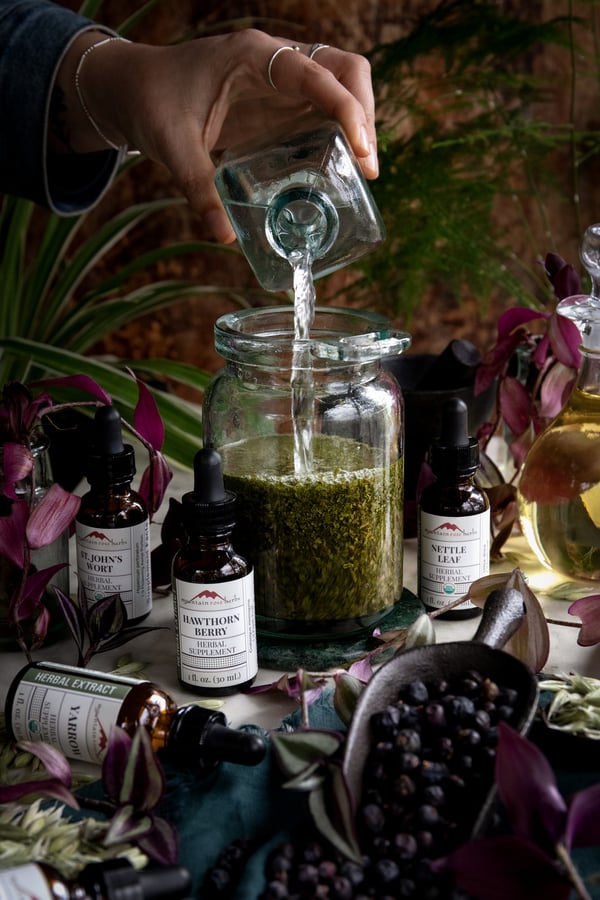 Herbal tinctures on a table.