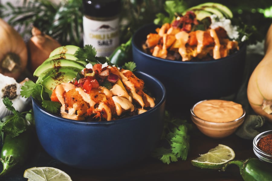 Butternut squash taco bowls with chili lime salt and veggies.