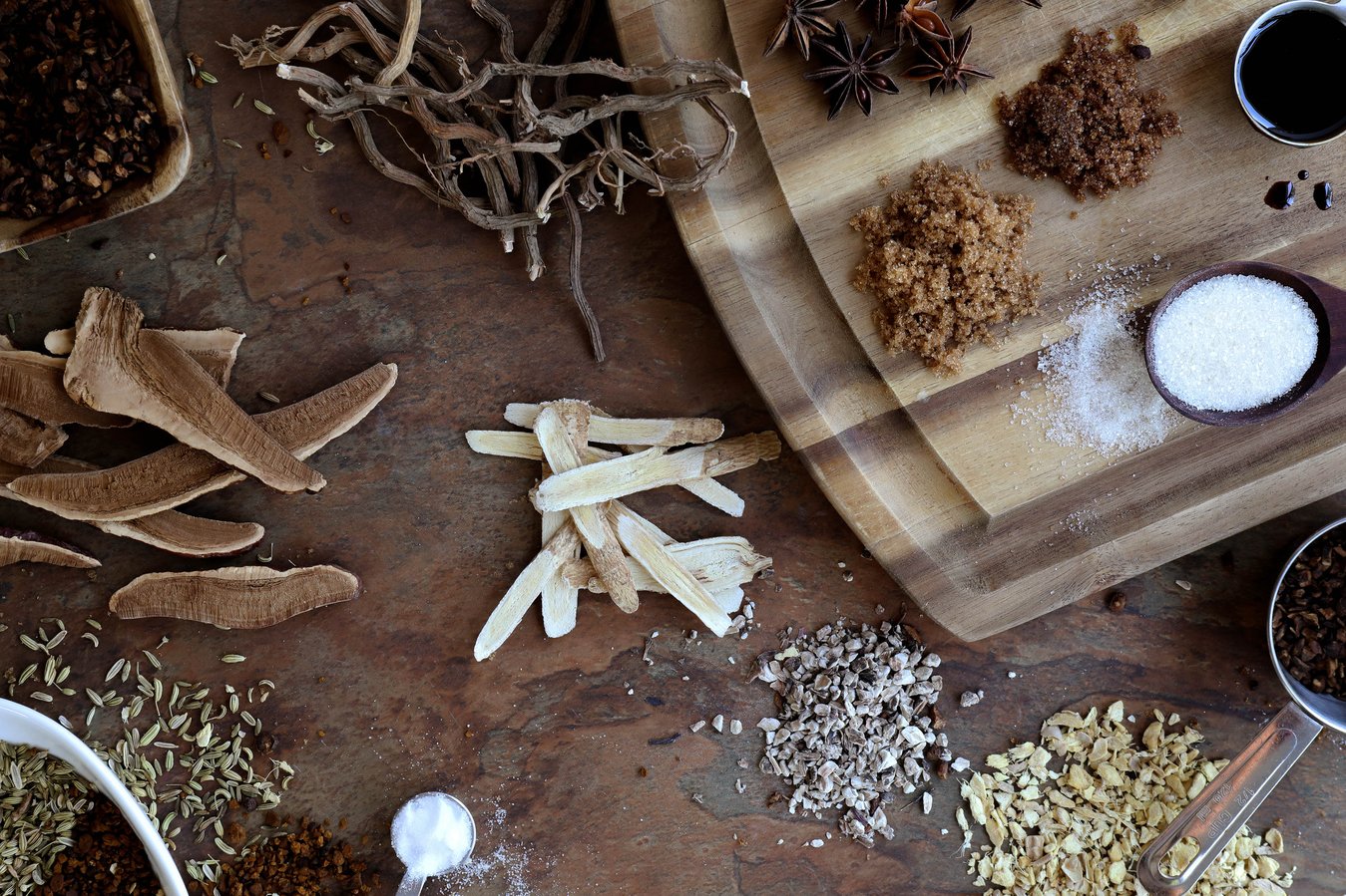 Root beer ingredients including astragalus, reishi, and brown sugar. 