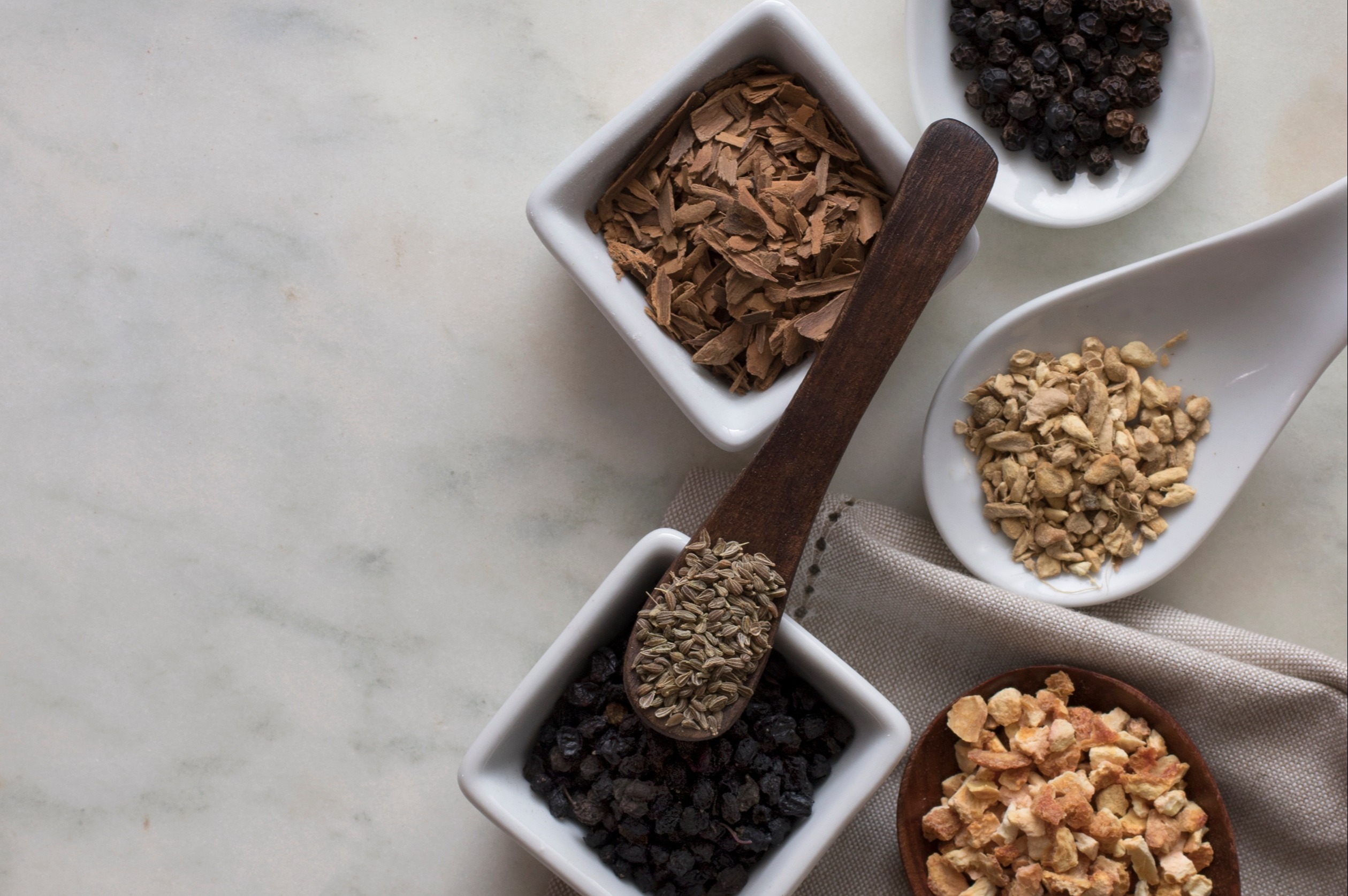 Herbs and spices come together to make delicious tea blends for any occasion. Seeds, dried berries, citrus peel, and aromatic roots can all be incorporated into tea blends for health and happiness.