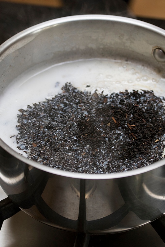 Chai Tea Brewing in Pot with Milk