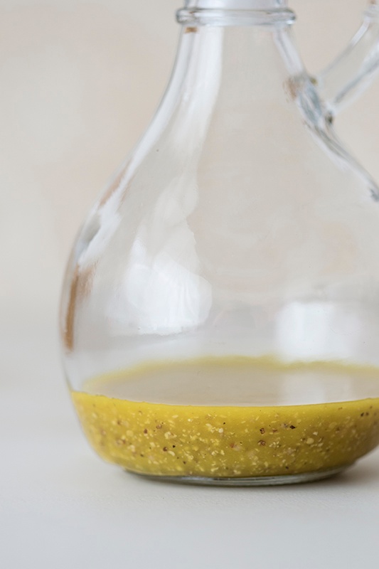 Homemade Vinaigrette in round glass pitcher