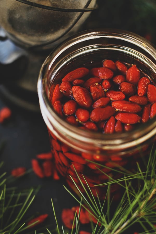 Goji berries infusing in rum for a winter cocktail