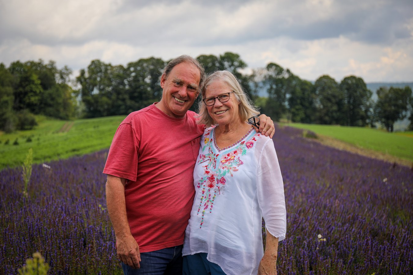 The owners of Foster Farm on their land in Vermont.