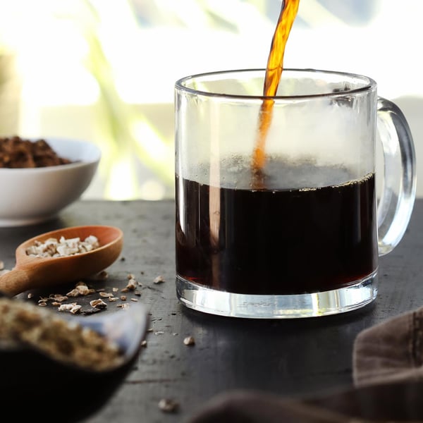 Rooty tea decoction with dandelion, burdock, and chicory root.