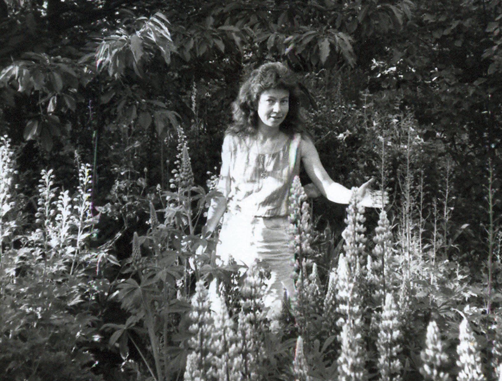 Mountain Rose Herbs' founder and owner, Julie Bailey, photographed on an herbal collection hunt many years ago. Julie always strived to collect the best, sustainably grown herbs for her budding business.