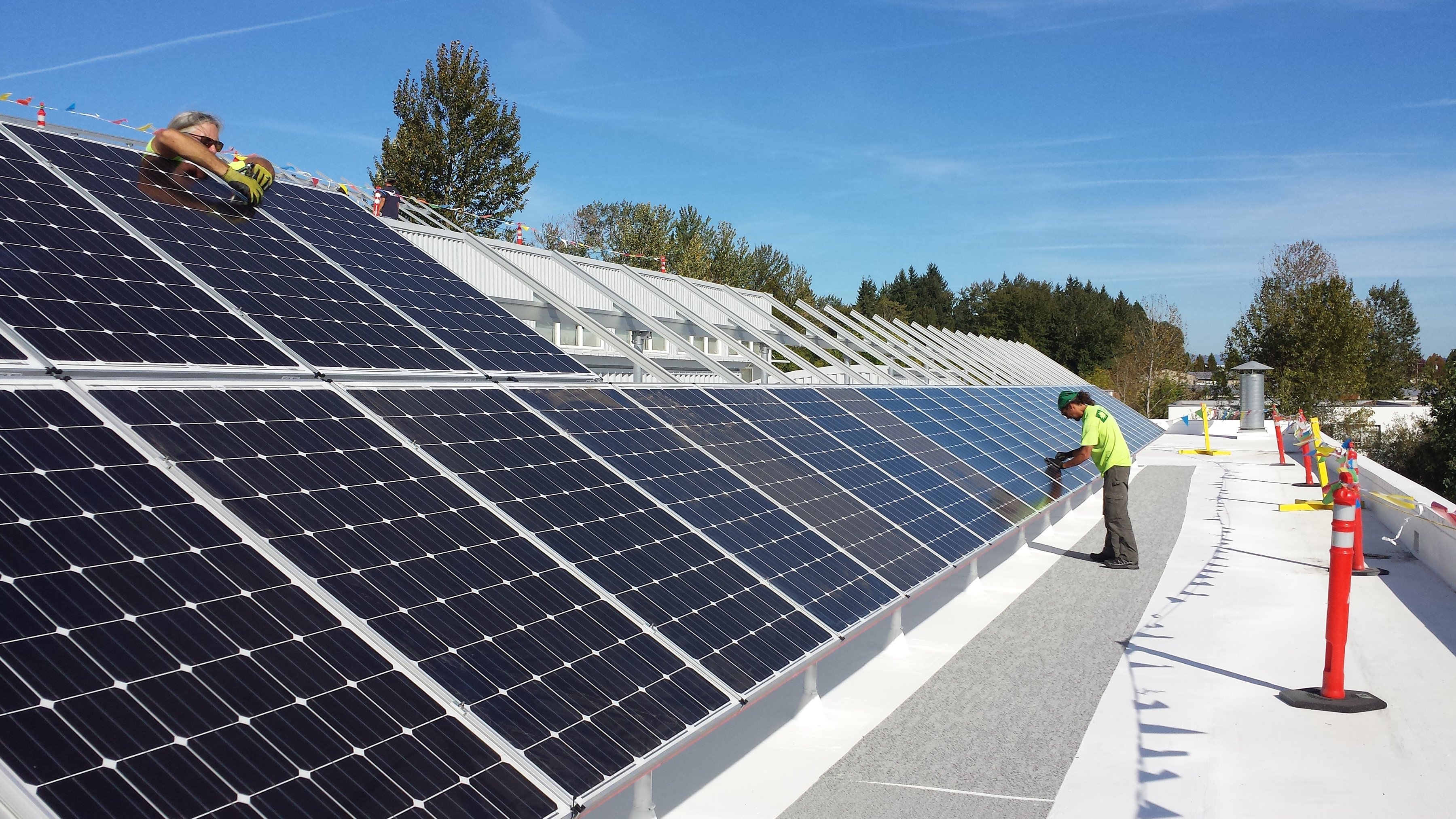 Long rows of solar panels are installed at a LEED certified building in Oregon.